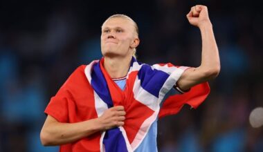 Erling Haaland, draped in a Norway flag, celebrates Manchester City's victory over Real Madrid in the Champions League in May 2023.