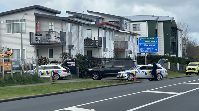 Officers at the scene in Flat Bush this morning.