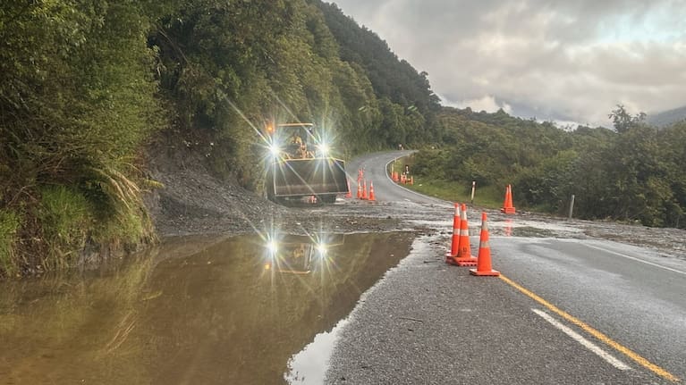 Part of State Highway 73 on the West Coast has reopened to traffic under a temporary 30km/h speed limit after heavy rain caused slips yesterday.