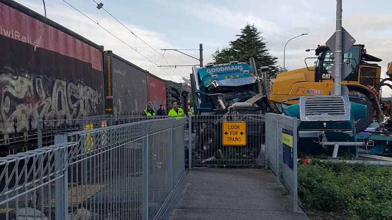 Police were notified that a truck and freight train had collided at 6.20am.