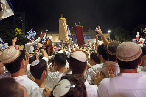 Israelis mark Simchat Torah with renewed joy after hostage releases