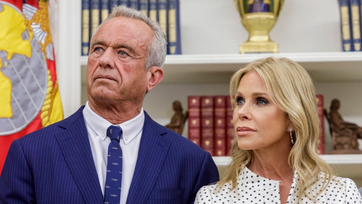 Robert F. Kennedy, Jr. is pictured beside his wife, Cheryl Hines.