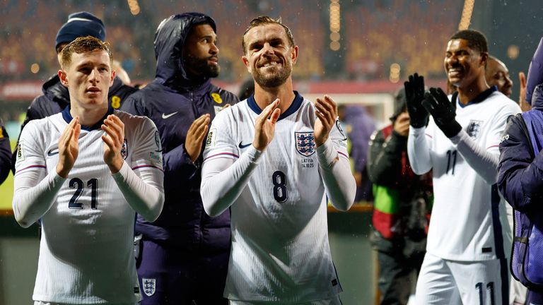 Elliot Anderson, Jordan Henderson and Marcus Rashford applaud fans after the match. Pic: AP