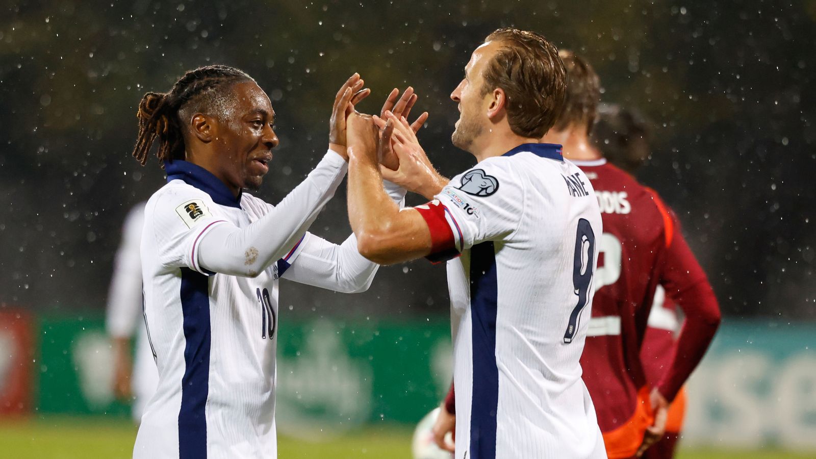 Eberechi Eze celebrates with Harry Kane after scoring England's fifth goal. Pic: AP