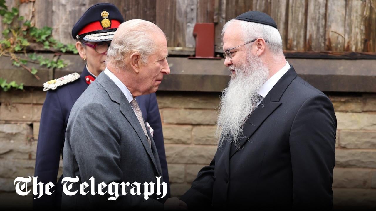 King Charles visits scene of Manchester synagogue terror attack, wears kippah and warns that ‘ghastly’ social media is radicalising people