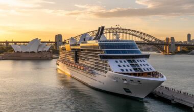 Celebrity edge docked in sydney harbour with iconic landmarks in the backdrop.