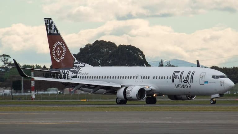 The plane landing back at Christchurch Airport.