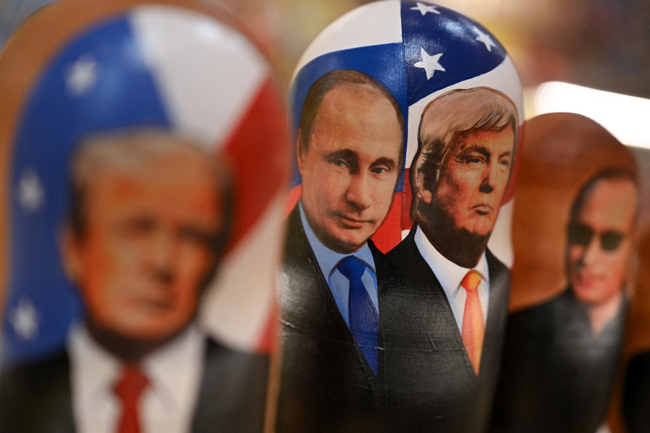 Traditional Russian wooden nesting dolls, Matryoshka dolls, depicting Russian President Vladimir Putin and US President Donald Trump are displayed for sale at a gift shop on the touristic Arbat street in downtown Moscow on Oct. 21, 2025. (AFP Photo)