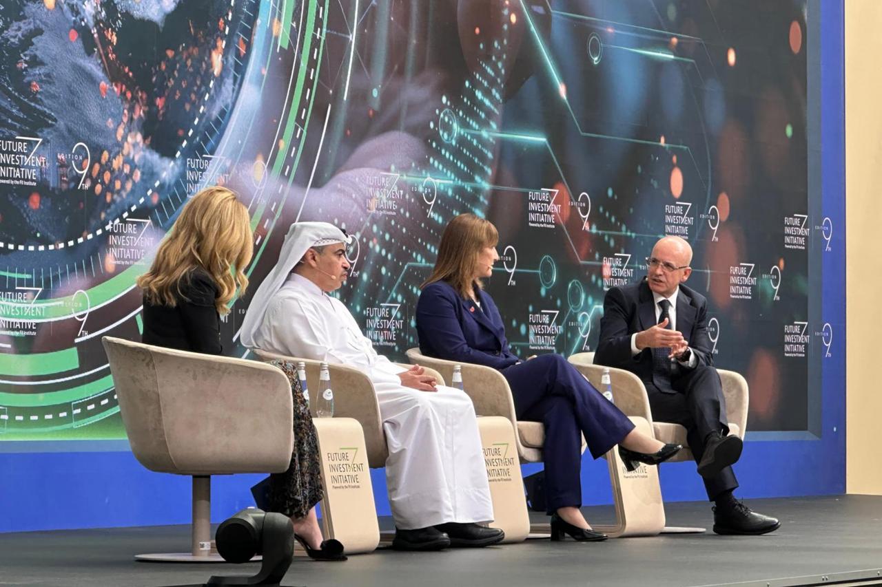 Turkish Treasury and Finance Minister Mehmet Simsek (R) speaks during a panel at the 9th Future Investment Initiative (FII) held in Riyadh, the capital of Saudi Arabia, October 28, 2025. (AA Photo)