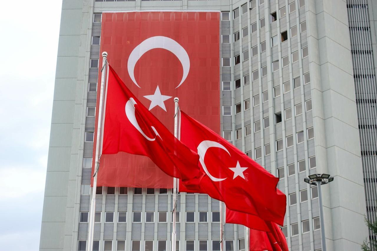 Turkish National Flags hanging over the Foreign Ministry Building in Ankara, Türkiye at an undated time, accessed on March 30, 2025. (Adobe Stock Photo)