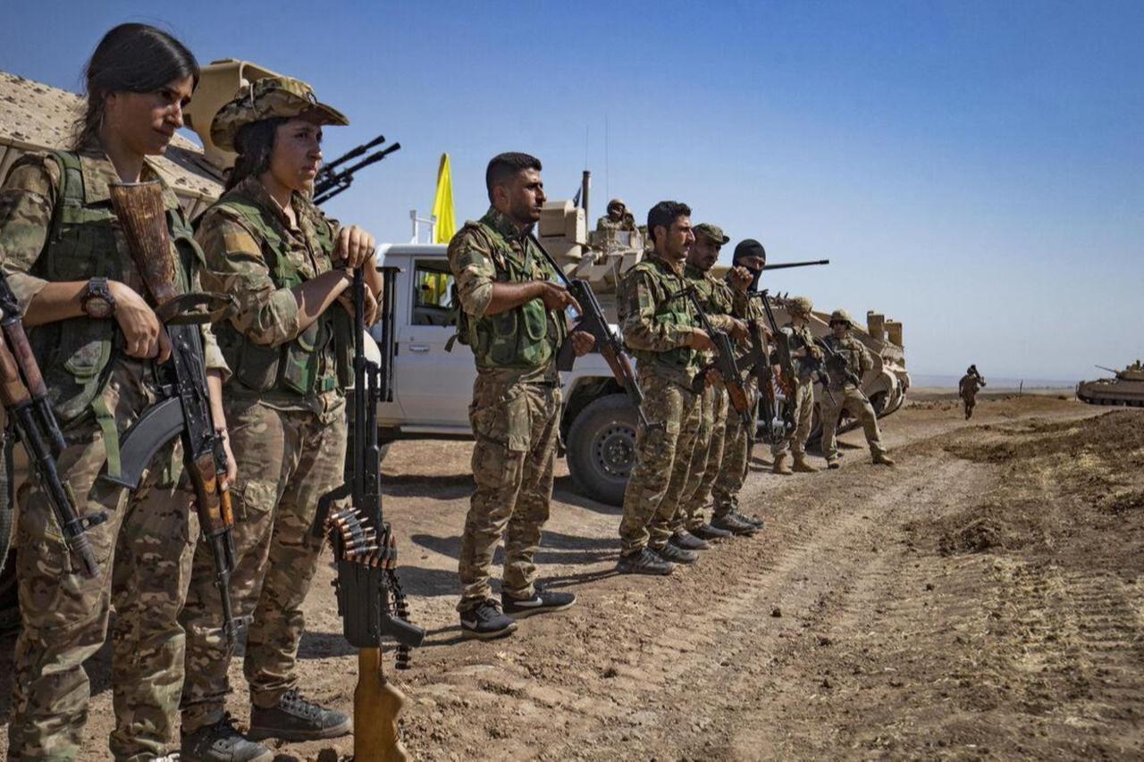 Terrorist organization YPG-led SDF members attend a joint military exercise with forces of US coalition in Syrias northeastern al-Hasakah province, September 7, 2022. (AFP Photo)