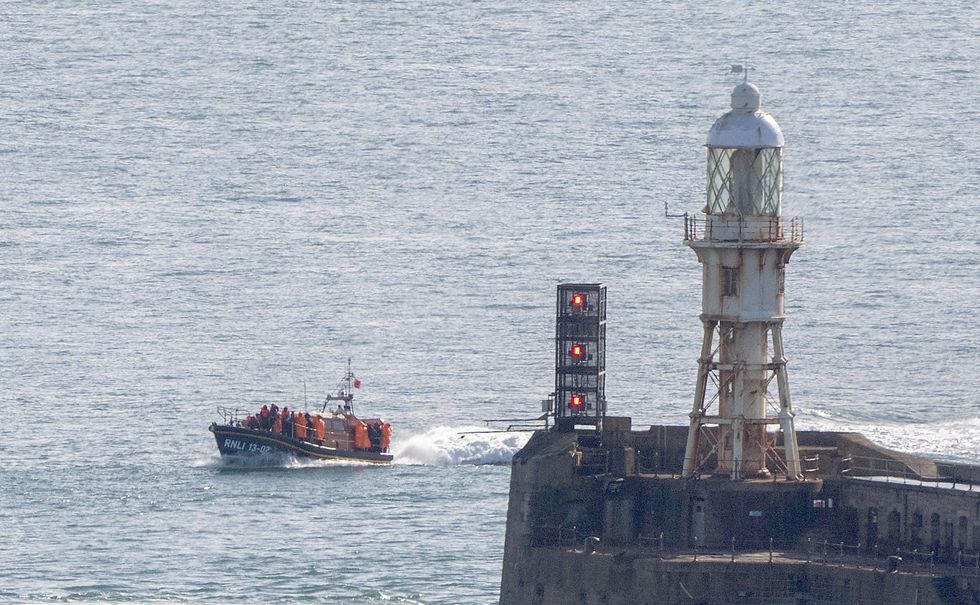 \u200bSmall boat migrants arriving in Dover