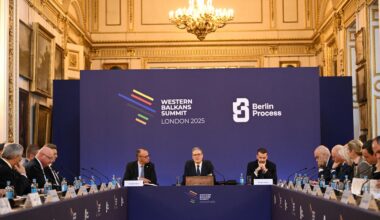 Britains Prime Minister Keir Starmer (C) flanked by German Chancellor Friedrich Merz (CL) and Montenegros Prime Minister Milojko Spajic (CR) hosts the plenary session of the Western Balkans Summit in central London, United Kingdom on October 22, 2025. (AFP Photo)