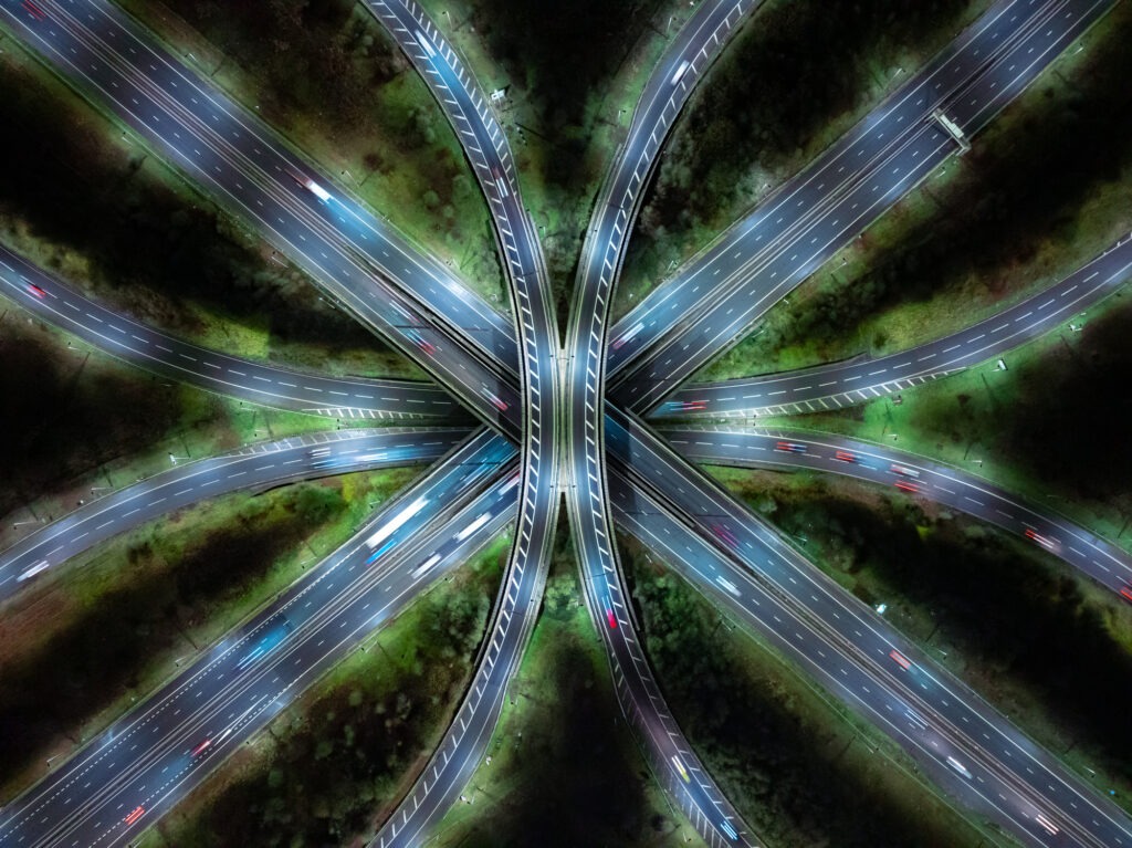 Aerial night shot of Almondsbury Roundabout at Junction 16, M5 and M4 motorway near Bristol, UK