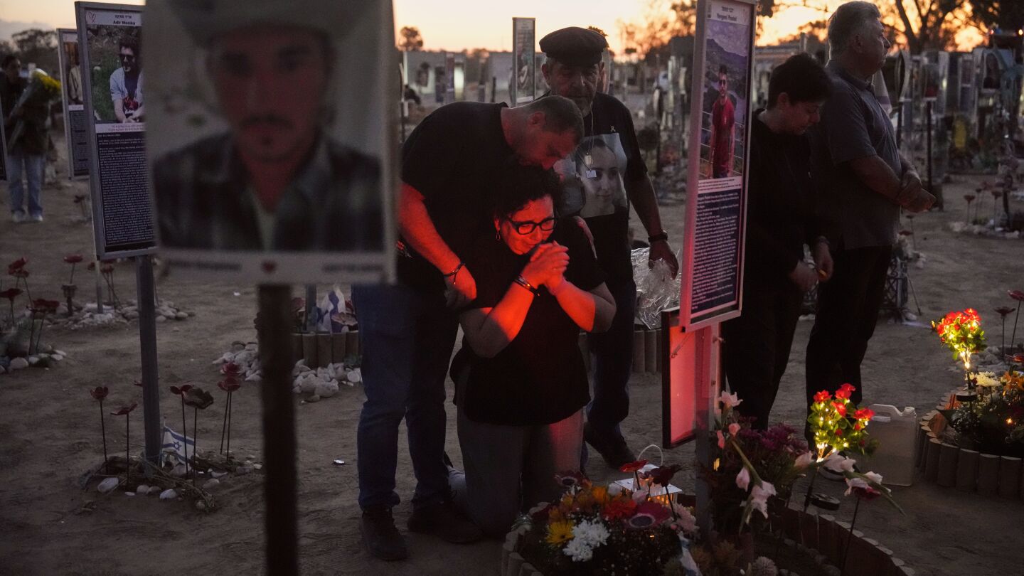 Israelis honor victims 2 years after Hamas attack as talks resume, in photos