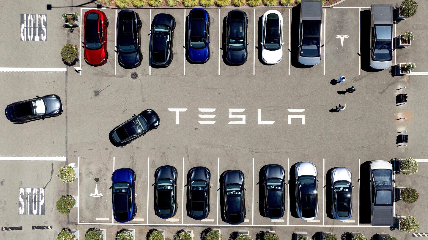 Parents sue Tesla over alleged flaw that trapped daughter in burning car