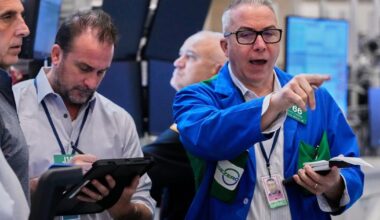 Wall Street climbs to the cusp of records as oil prices jump