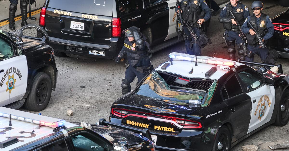 Feds charge 12 in alleged arson, attacks during immigration protests