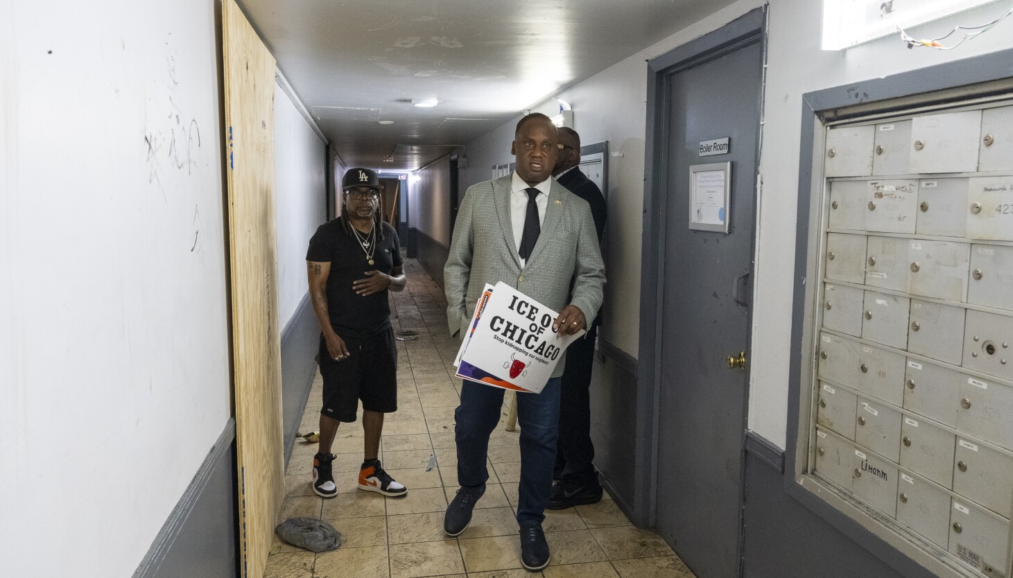 After military-style raid on South Shore apartments, Congress members rally around residents