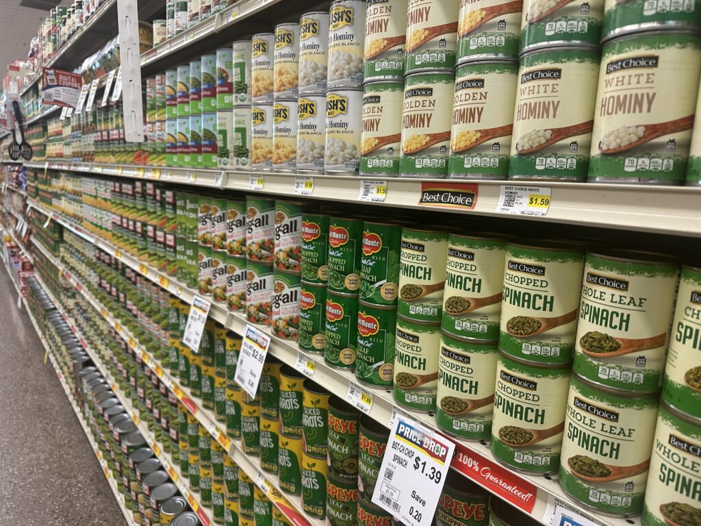 Canned foods on grocery store shelves. (Photo by Cami Koons/Iowa Capital Dispatch)