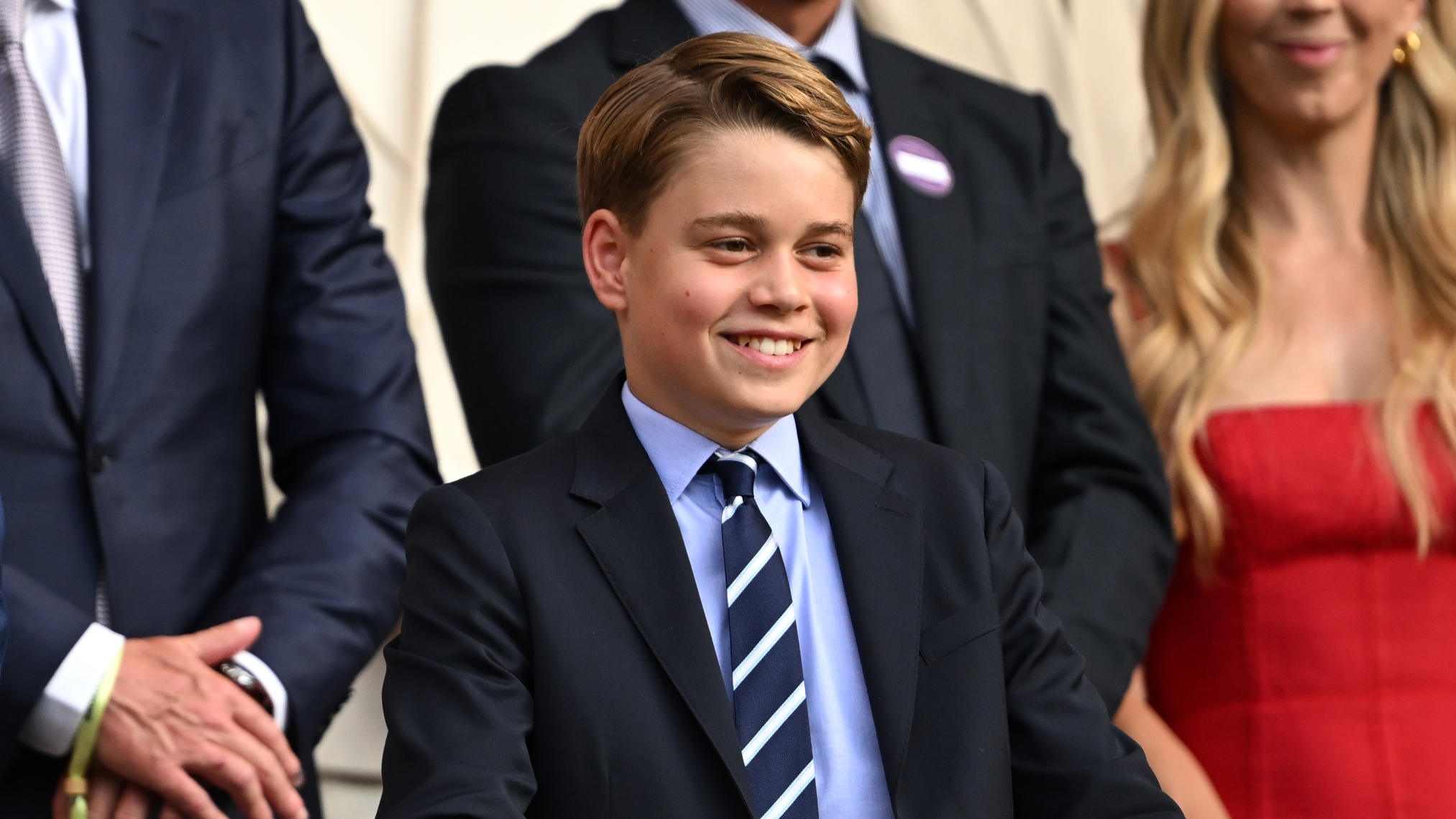Prince George of Wales smiles in the Royal Box during the trophy presentation following the Gentleman's Singles Final at Wimbledon 2025