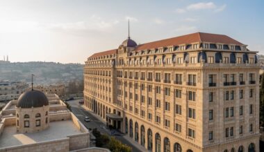 "the historic waldorf astoria jerusalem hotel blends classic and contemporary architectural styles.