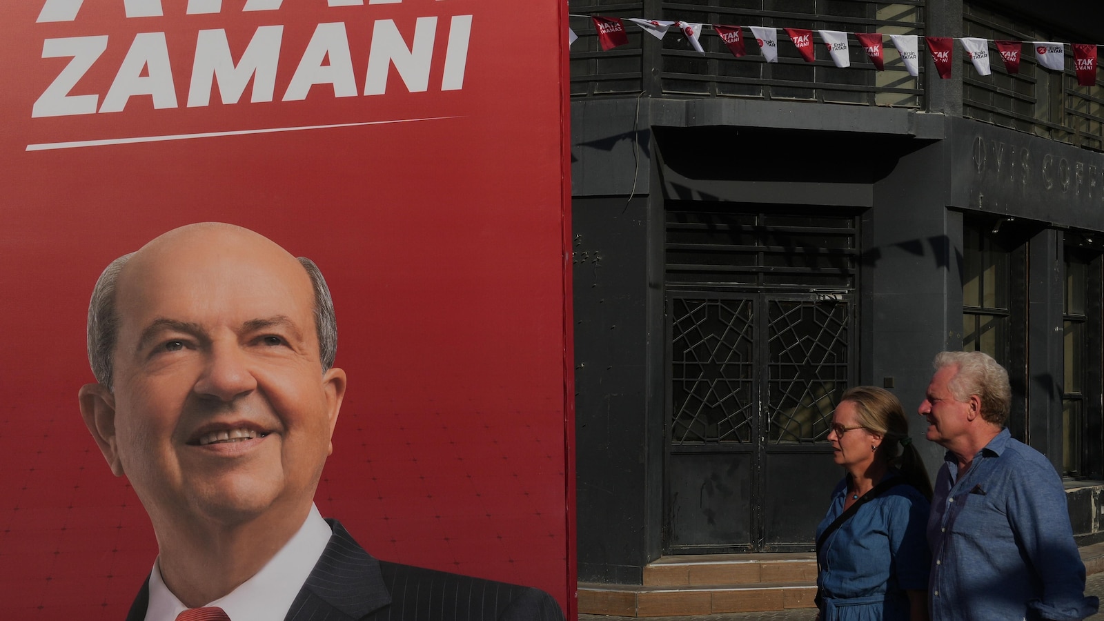 Turkish Cypriots vote in an election seen as a choice on deeper Turkey ties or closer EU relations