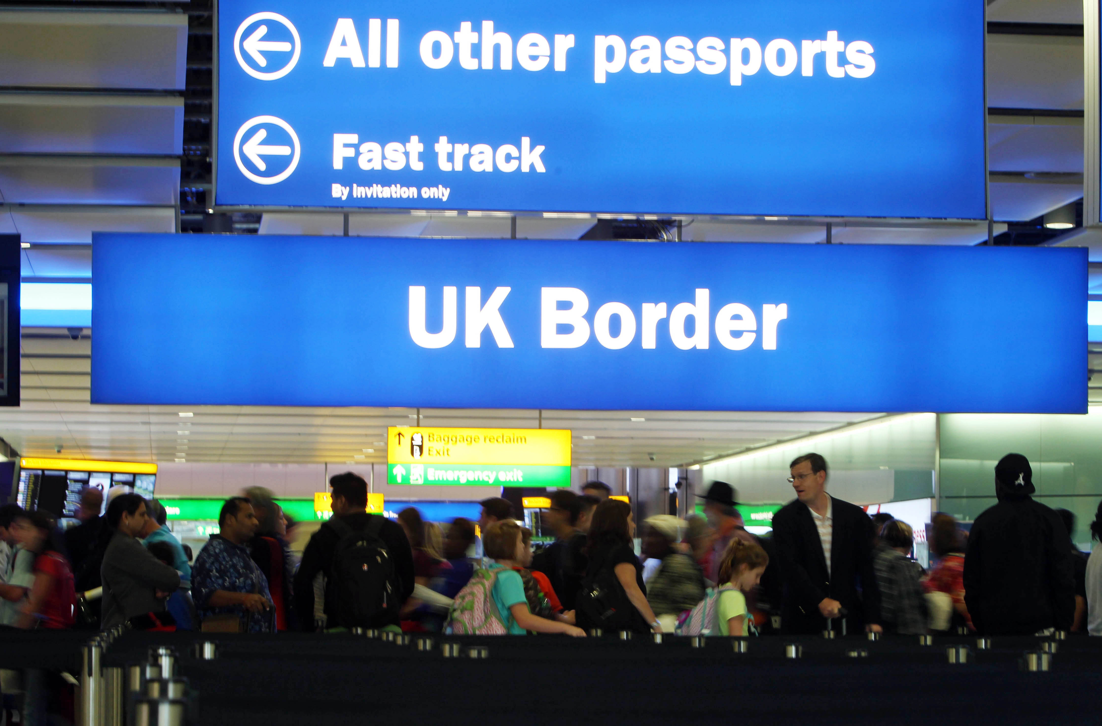 Passengers going through the UK Border at Terminal 2 of Heathrow Airport.