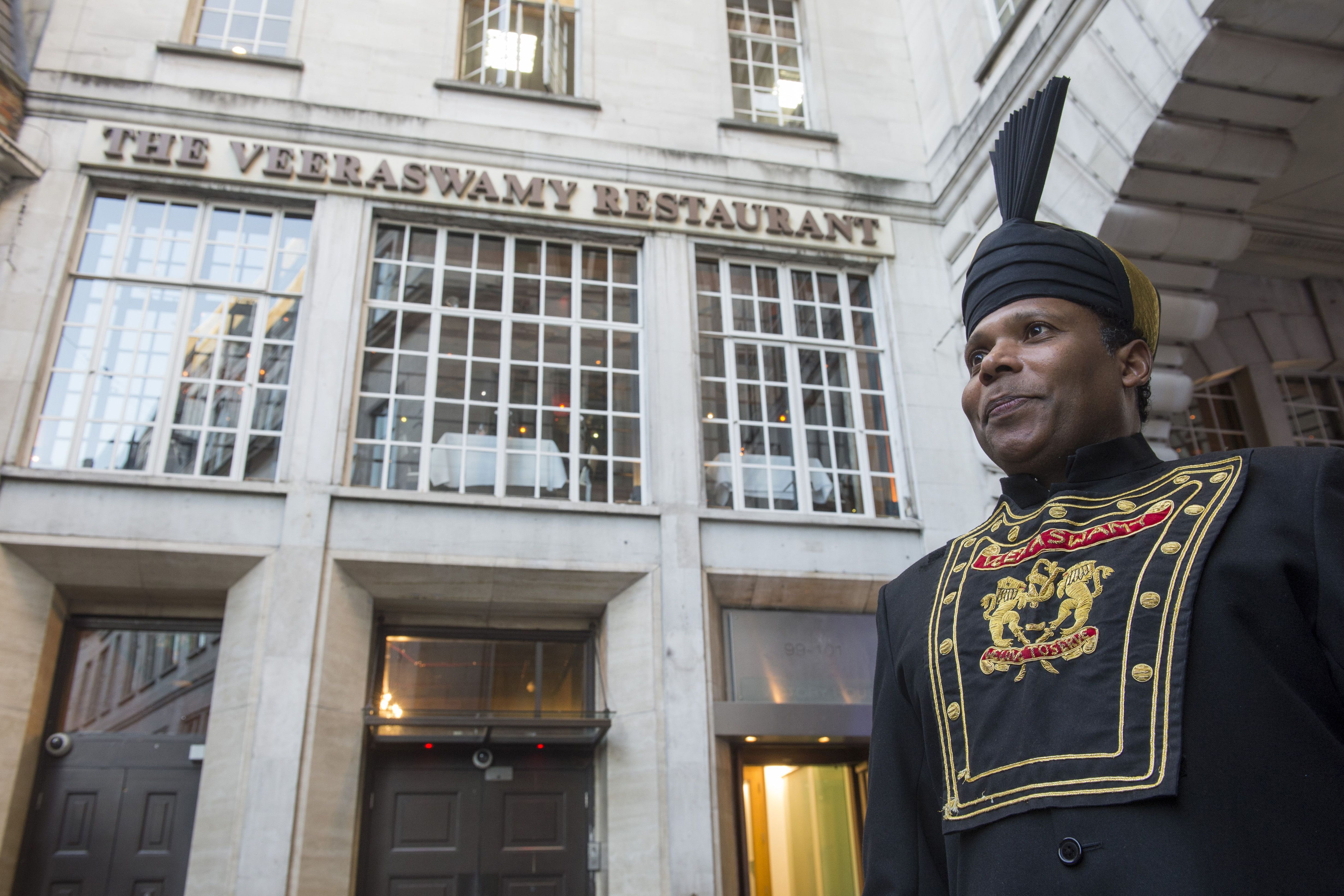 Executive Chef Uday Salumkhe in uniform outside Veeraswamy Restaurant.