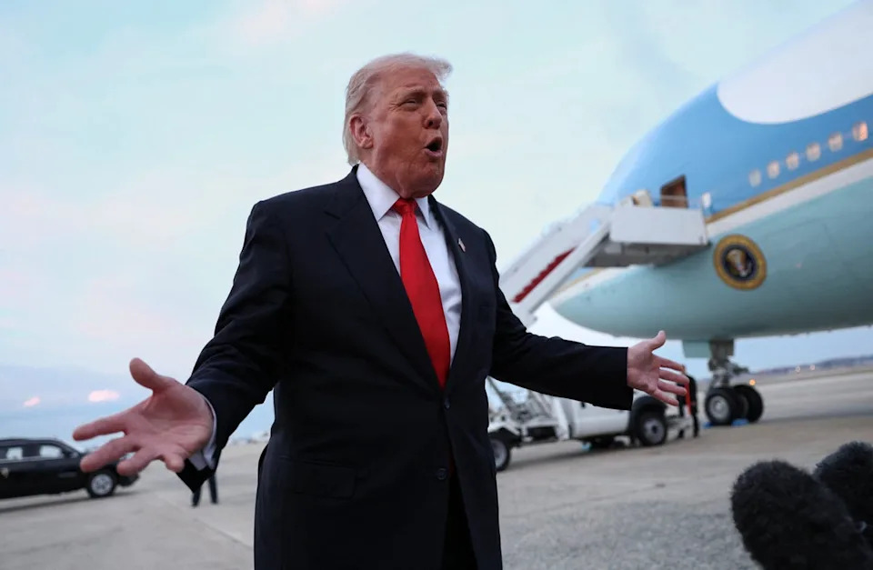 Trump speaks to reporters upon his return to Washington at Joint Base Andrews in Maryland Sunday (REUTERS)