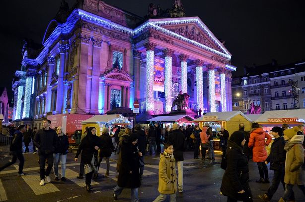 Part of what makes the markets special are the light projections on Brussels' buildings 