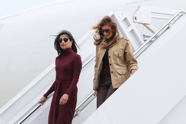 RICHLANDS, NORTH CAROLINA - NOVEMBER 19: Second lady Usha Vance (L) and first lady Melania Trump depart a plane as they arrive at Albert J. Ellis Airport en route to Camp Lejeune on November 19, 2025 in Richlands, North Carolina. Trump and Vance are traveling together for the day to visit military families and schools at Marine Corps Base Camp Lejeune. (Photo by Anna Moneymaker/Getty Images