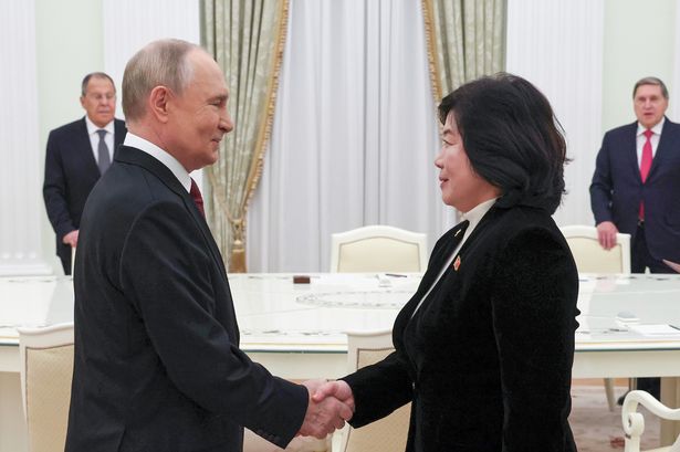Putin meets North Korea puppet for 'outcast handshake' as they're choked with sanctions