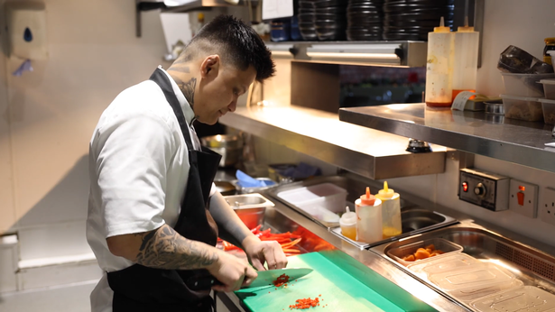 Michael Navarro preparing for service at KION restaurant
