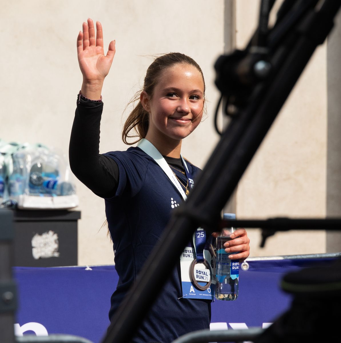 Princess Josephine waves at the finish line after attending the "5 km" run of Royal Run.