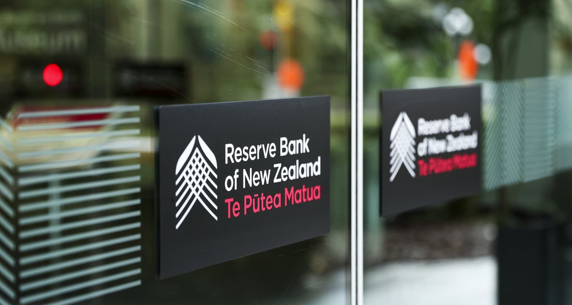 New Zealand central bank cuts rates to over 3-year low, signals end to easing cycle