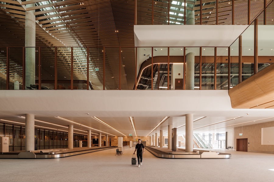 Western Sydney International Airport undulating slatted wood ceiling terminal baggage claim