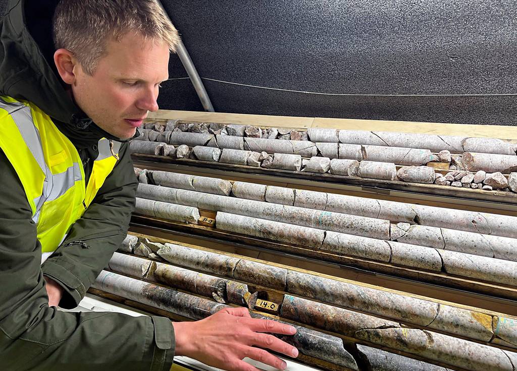 Eldur Ólafsson, CEO of Amaroq Minerals, examining samples at the …