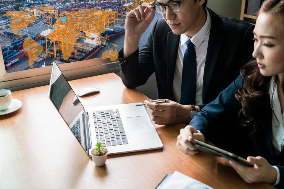 business meeting with industrial container cargo freight ship and Logistic Import Export background