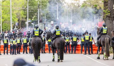 Police hunt more protesters over attack on officers