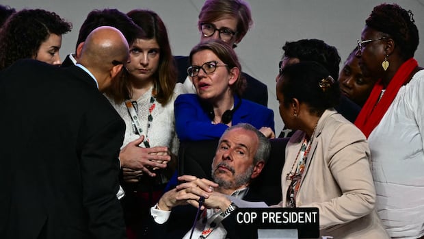 COP30 pushes through uneasy climate deal that sidesteps fossil fuel concerns