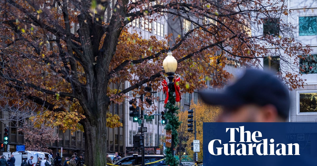 Shock and dismay after national guard troops shot near White House | US news