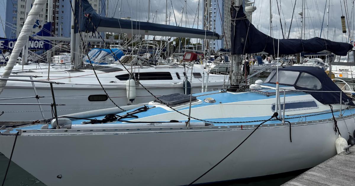 Two men admit charges after migrant yacht intercepted