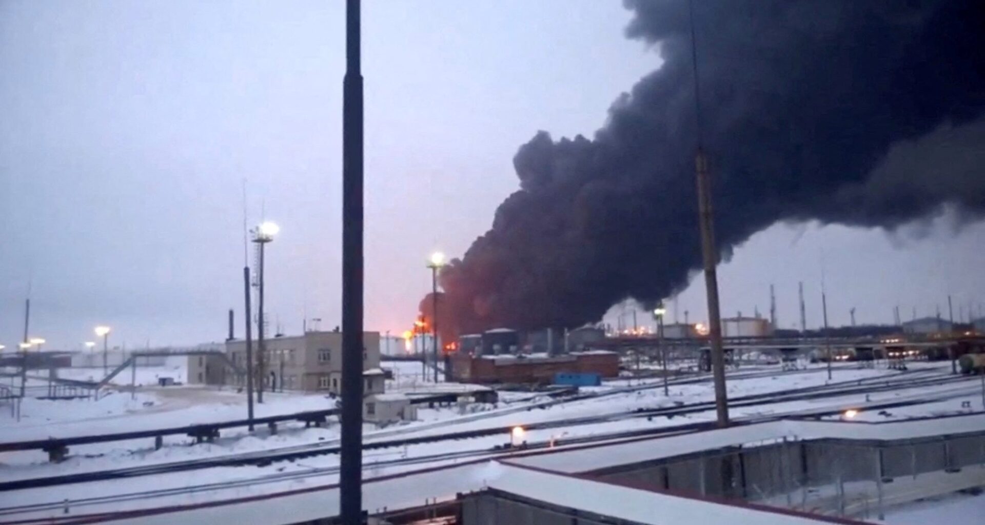 Smoke billows after Ukraine's SBU drone strikes a refinery, amid Russia's attack on Ukraine, in Ryazan, Ryazan Region, Russia, in this screen grab from a video obtained by Reuters, March 13, 2024. Video Obtained By Reuters/via REUTERS