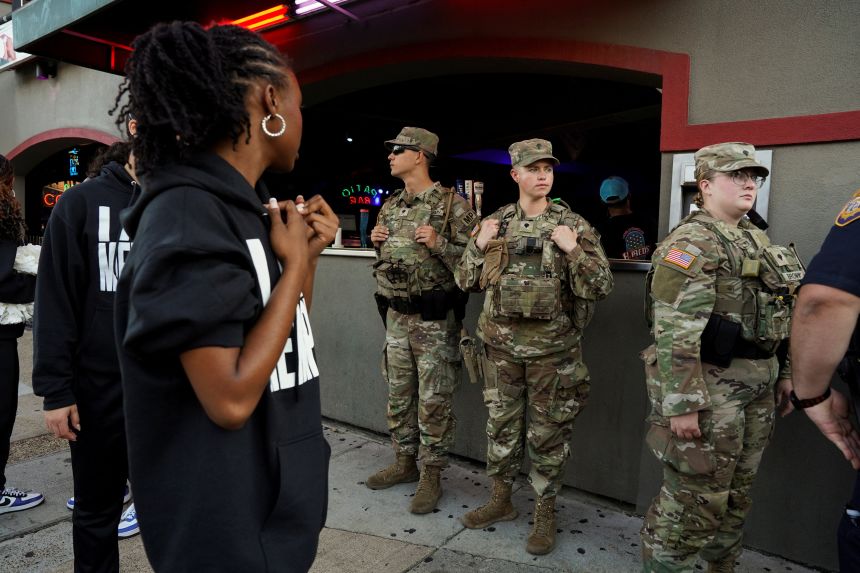 US Army National Guard members patrol Beale Street in downtown Memphis, Tennessee, on October 16.