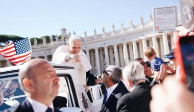 Pope Leo XIV spies a pizza sign in the middle of Vatican Square.