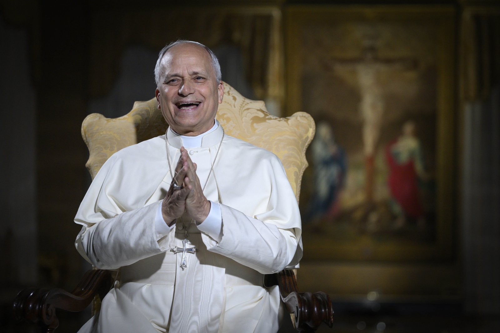 Pope Leo XIV laughs during a meeting livestreamed from the Vatican with 16,000 young people gathered at the National Catholic Youth Conference in Indianapolis on Nov. 21. (CNS photo/Vatican Media)