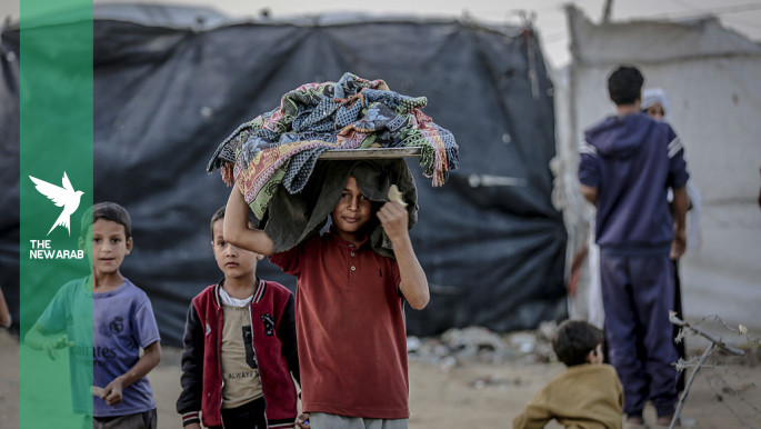 Israeli massacre in Lebanon camp kills 14, as drones target Gaza