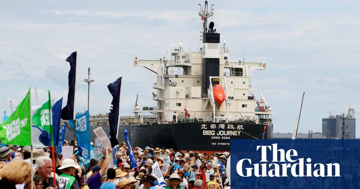 Rising Tide protest: climate activists stop three ships from entering world’s largest coal port in Newcastle | NSW police arrest 141 people as campaigners demand federal government cancel planned fossil fuel projects and tax existing operations at 78% and the Hunter