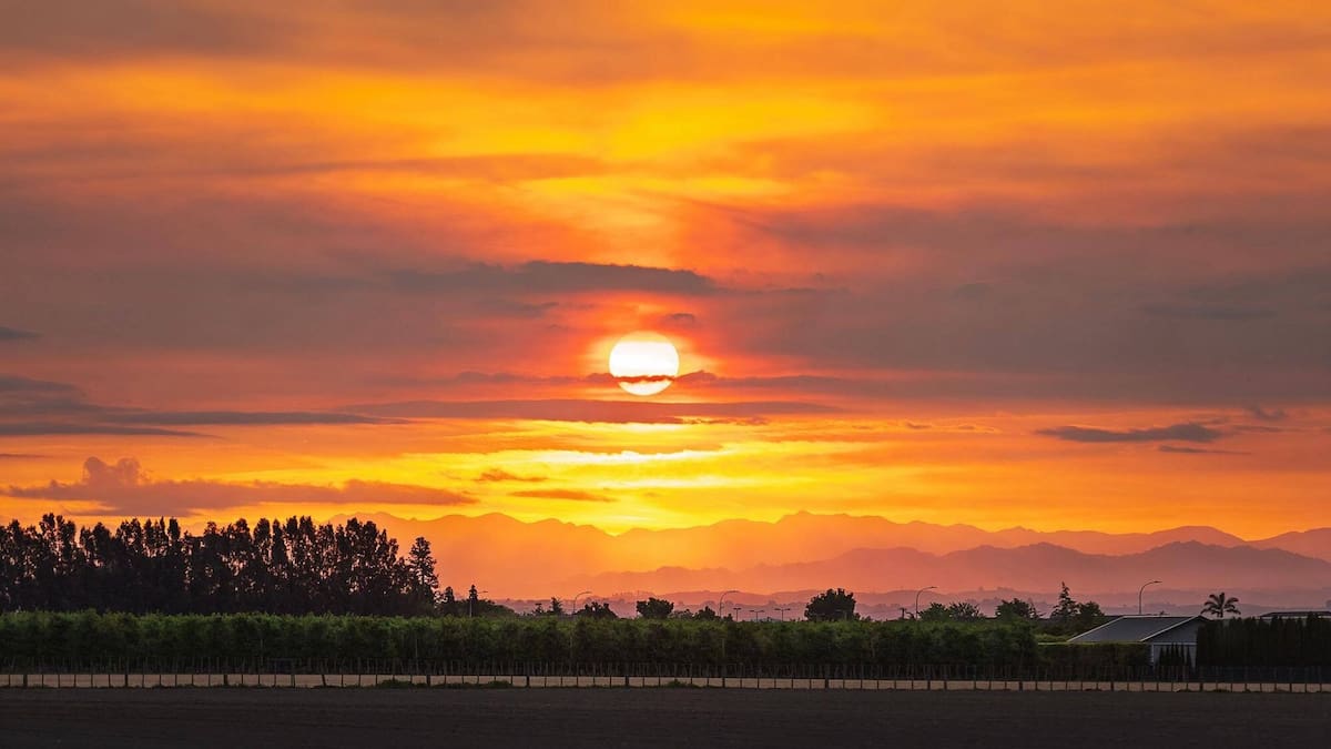Sunset photos: Tongariro fire turns Hawke’s Bay skies red